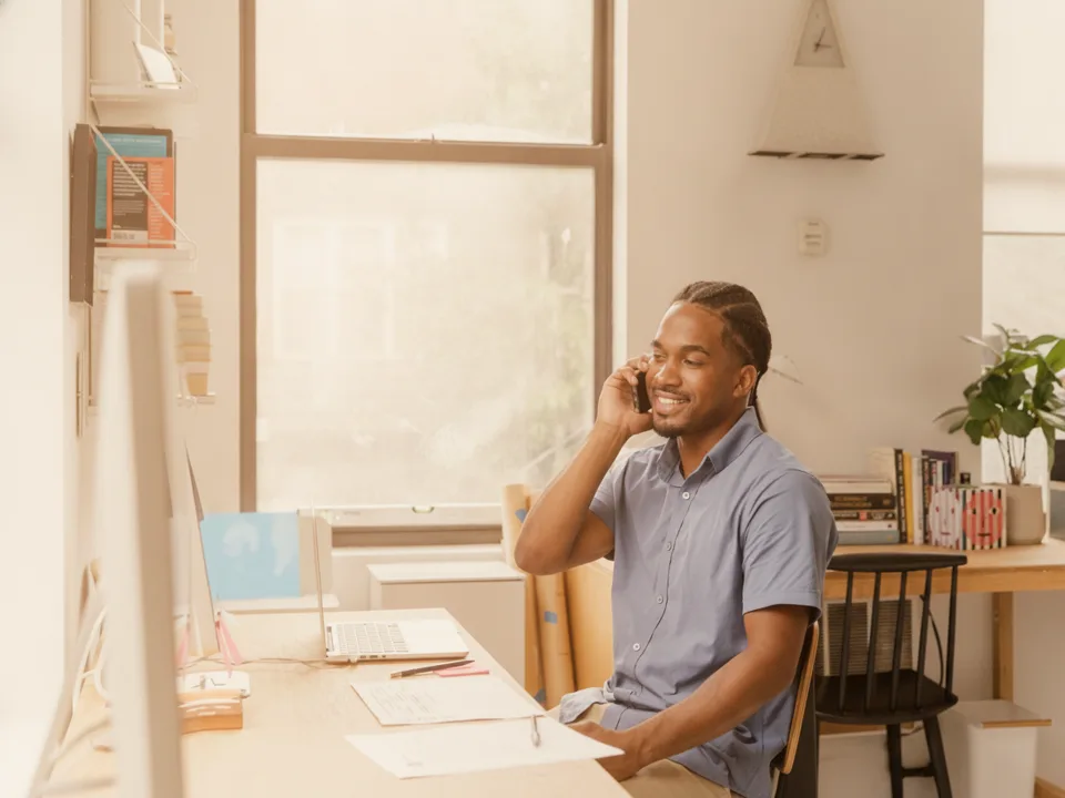 Friendly consultant taking a customer call